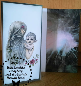 Grayscale Coloring Page, Cute Baby Elf and his Mama. Mama Elf's Loving Embrace