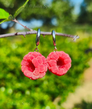Handmade polymer clay raspberry earrings with velvety texture and stainless steel hoops by Julia Spiri