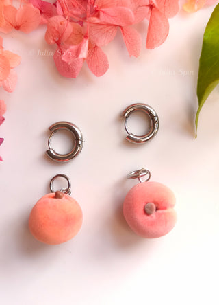 Handmade polymer clay peach huggie earrings by Julia Spiri, realistic velvety texture, stainless steel hardware