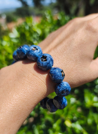 Handcrafted blueberry polymer clay bracelet worn on wrist, cottagecore fruit jewelry by Julia Spiri