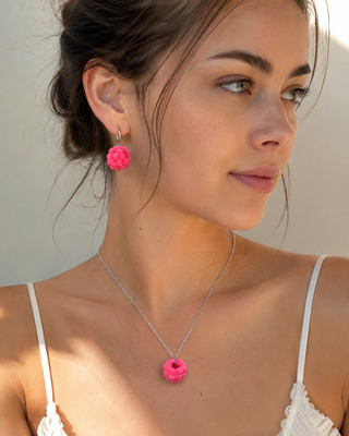 girl model with set of handmade polymer clay raspberry earrings and necklace by Julia Spiri