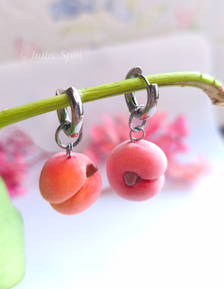 Handmade polymer clay peach huggie earrings by Julia Spiri, realistic velvety texture, stainless steel hardware