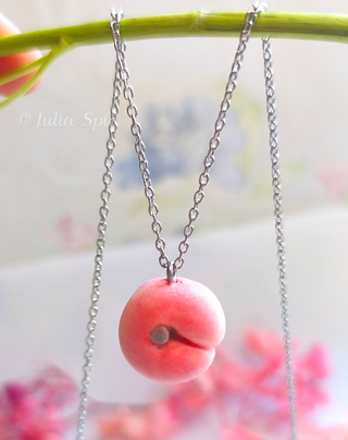 Handmade polymer clay peach pendant necklace by Julia Spiri, realistic velvety texture on delicate stainless steel chain