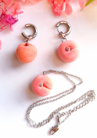 Handmade polymer clay peach jewelry set by Julia Spiri — matching huggie earrings and pendant necklace, stainless steel