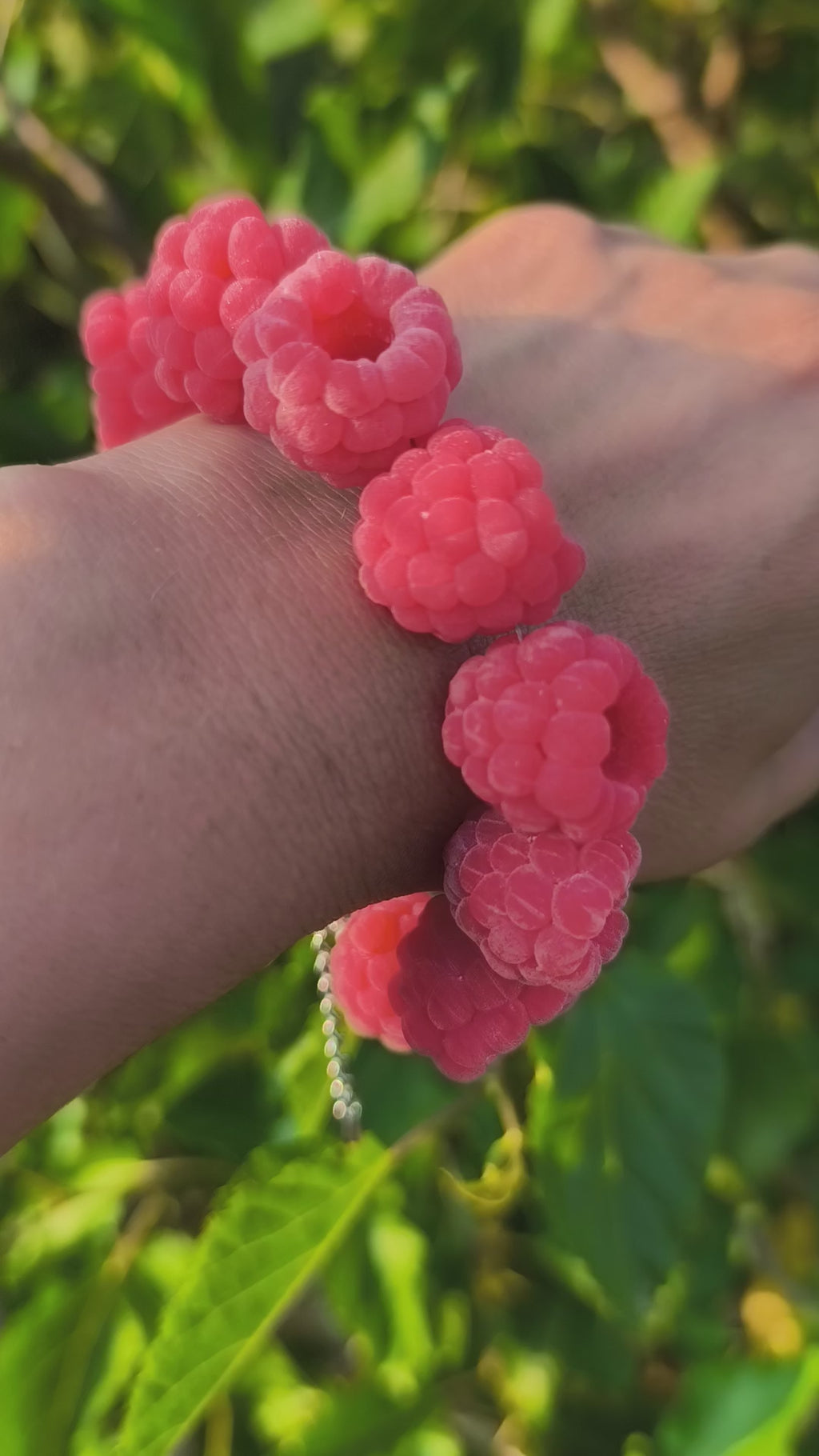 Video showcasing the handmade velvety raspberry polymer clay bracelet by Julia Spiri, highlighting texture and wearability